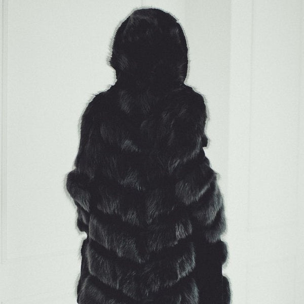 female fur coat with hood