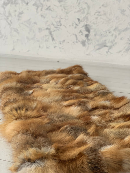 fox fur blanket floor