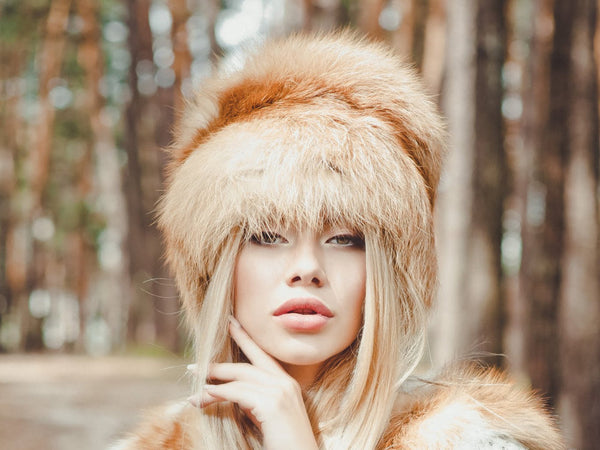 red fox fur hat with a tail