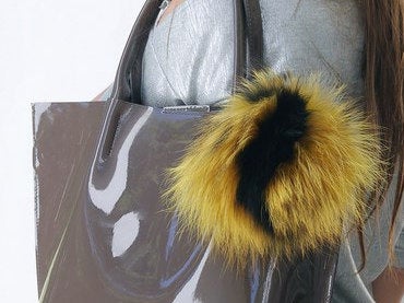 yellow bag charm in fur