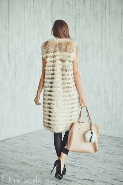 raccoon fur vest cost