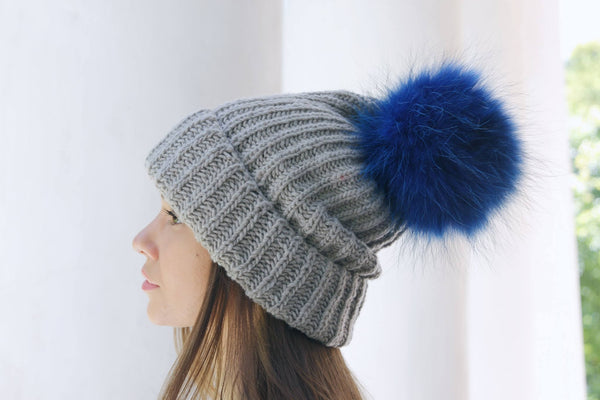 raccoon fur pom pom in blue