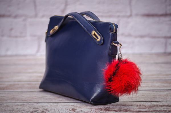 red raccoon fur bag charm