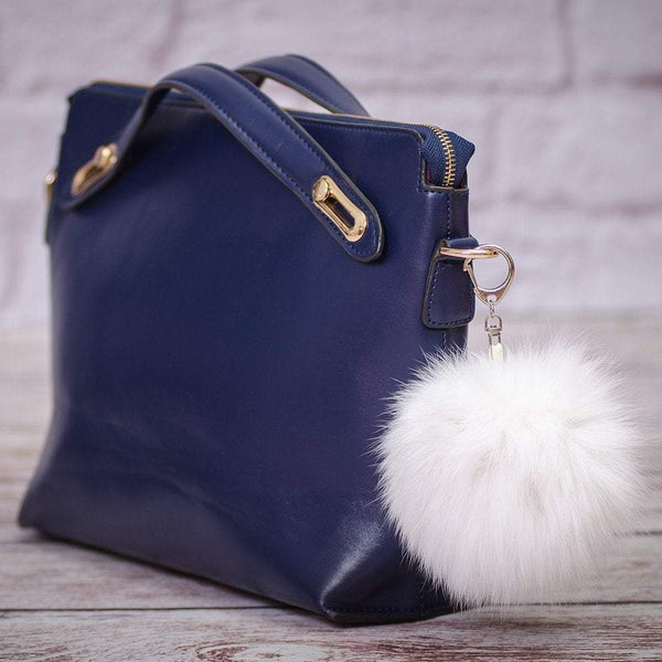 white raccoon fur bag charm